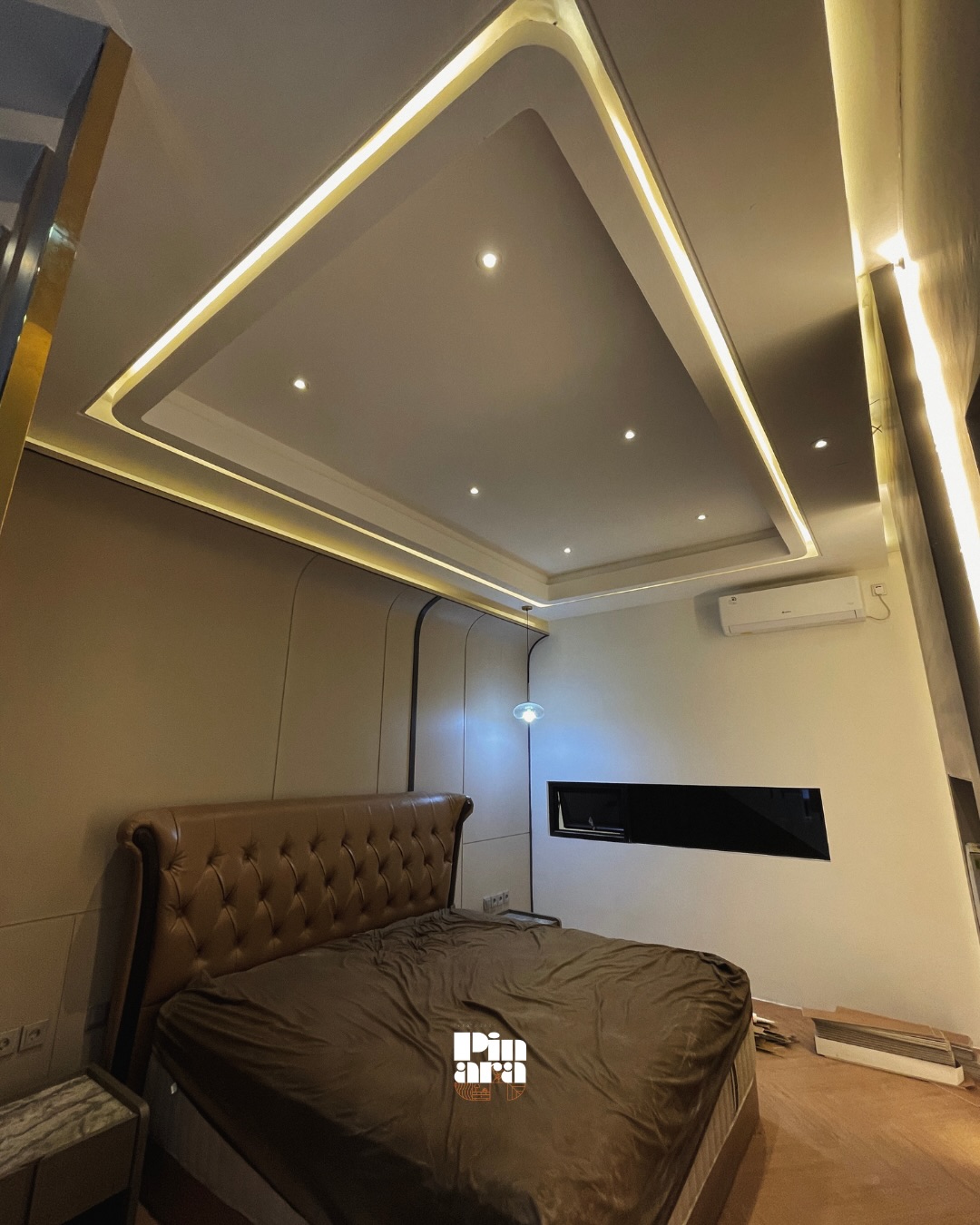 Pinara bedroom storage and warm lighting