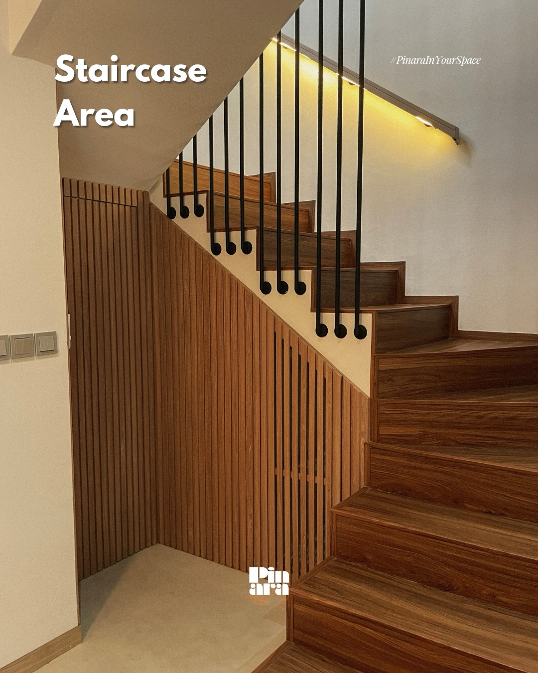 Pinara staircase with warm timber and lighting